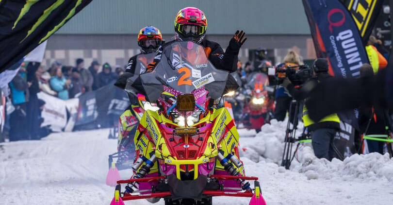 Racers at the finish line of the Iron Dog Snowmobile Race
