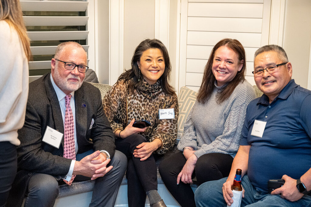 Michael (Mac) McHale, President, winner Doug Redfox, and other attendees at the Alaska Broadband Visionary Award ceremony