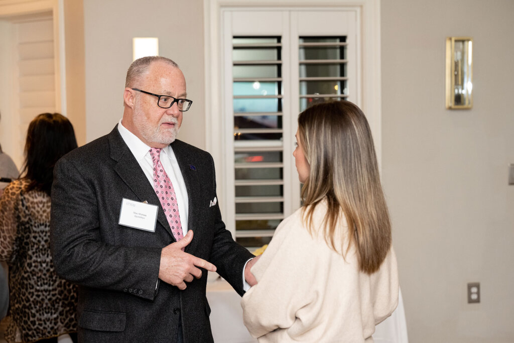 Michael (Mac) McHale, President chats at the Alaska Broadband Visionary Award ceremony