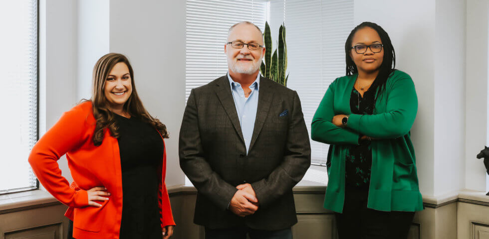 Photo of Quintillion team members, Mac, Ariel, and Ada